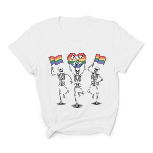 White t-shirt with skeletons holding rainbow flags and 'Love is Love' sign on a white background: Pride Skeleton Shirt, Love Is Love Gay Queer Halloween Tee, LGBTQ Dancing Skeletons T-Shirt, Rainbow LGBT Spooky Season Gift