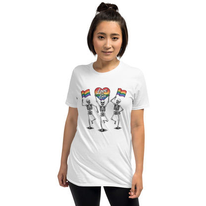 Person wearing a white t-shirt with skeleton designs and rainbow flags on a white background: Pride Skeleton Shirt, Love Is Love Gay Queer Halloween Tee, LGBTQ Dancing Skeletons T-Shirt, Rainbow LGBT Spooky Season Gift