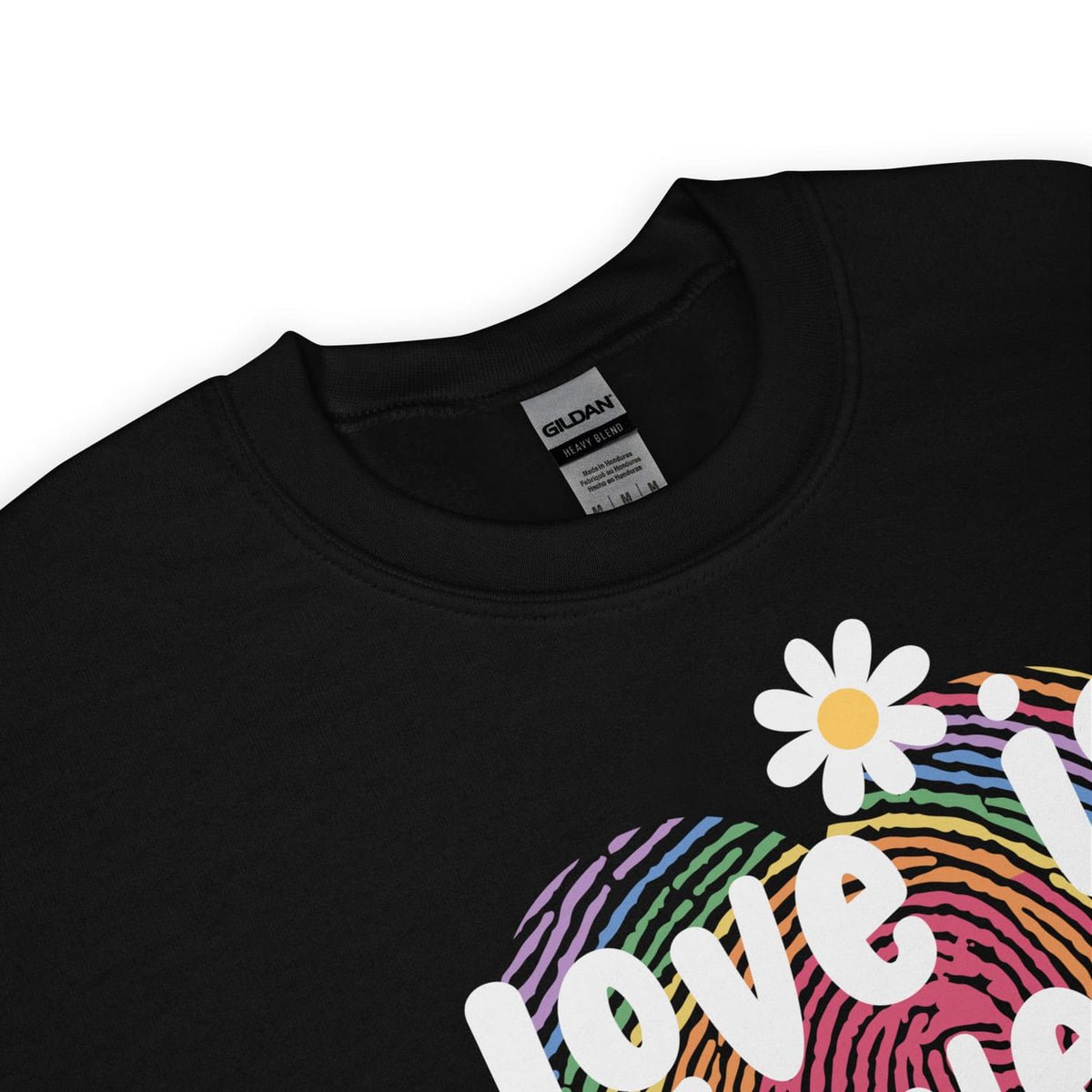 Black pride sweatshirt detail with rainbow design and flower graphic on a white background