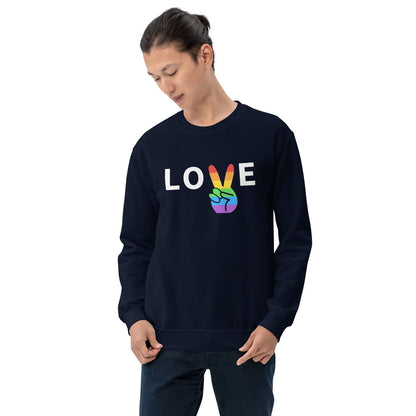 Person wearing a navy sweatshirt with 'LOVE' and rainbow peace symbol on a white background
