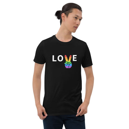 Person wearing a black t-shirt with 'LOVE' and rainbow peace symbol on a white background