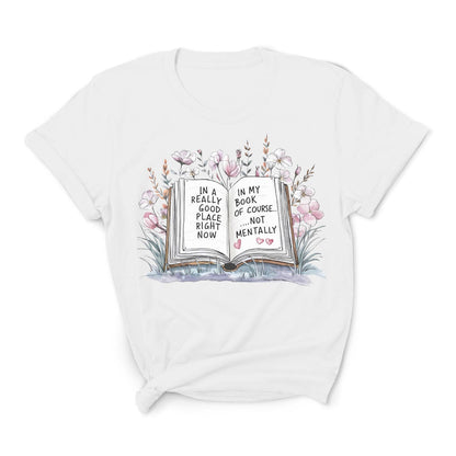 White t-shirt with an open book graphic and text on a white background