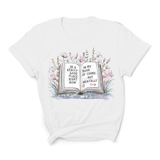 White t-shirt with an open book graphic and text on a white background