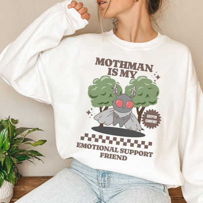 Person wearing a white mental health sweatshirt with a graphic design of Mothman and text.