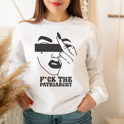 Person wearing a white sweatshirt with a feminist graphic design and text.
