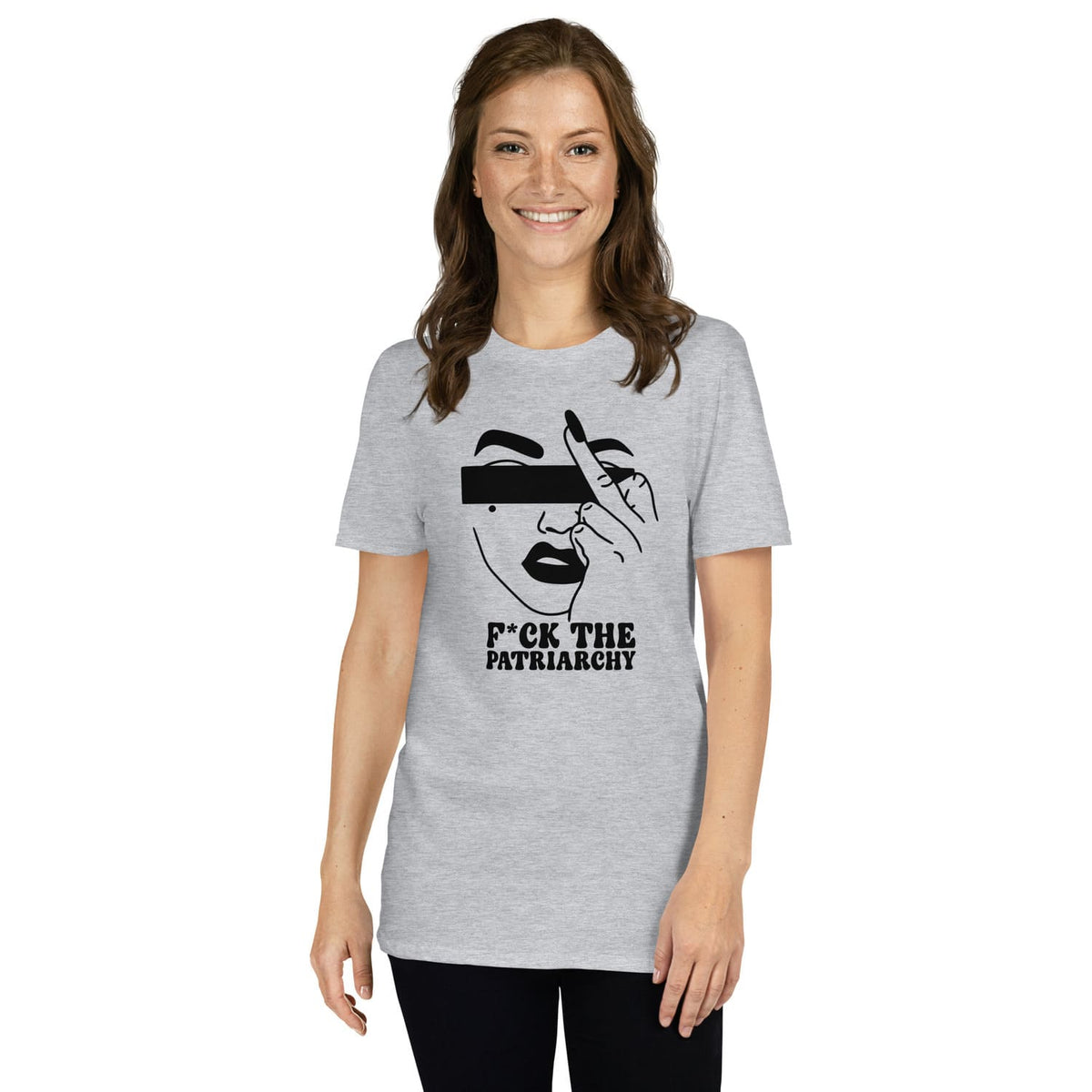 Woman wearing a gray feminist t-shirt with a graphic design and text on a white background