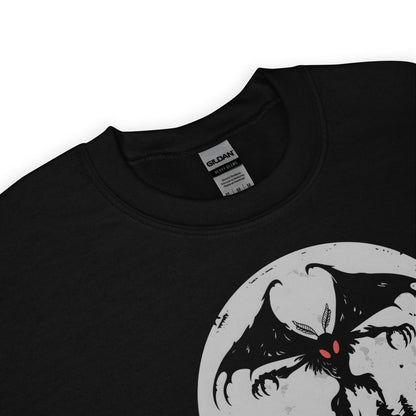 Black sweatshirt with a mothman graphic design of a creature on a white background