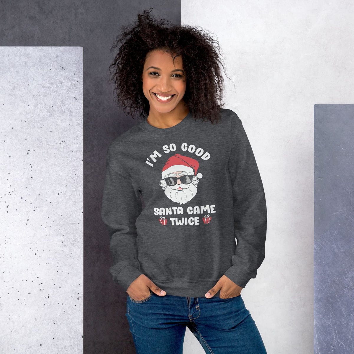 woman wearing dark heather naughty santa christmas sweatshirt