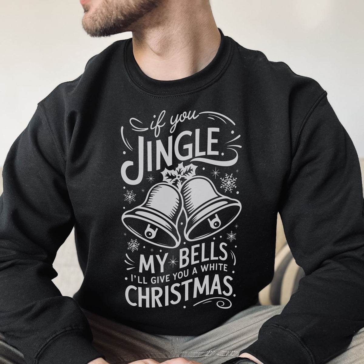 Black funny adult humor sweatshirt with Christmas-themed text and graphics on a neutral background