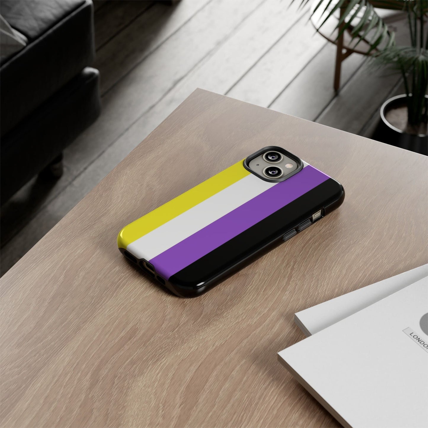 nonbinary flag phone case, on table