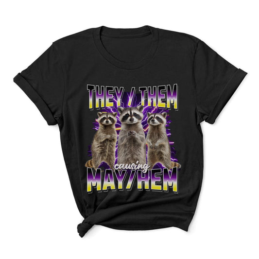 Black nonbinary bootleg t-shirt with raccoons and text 'THEY/THEM CAUSING MAYHEM' on a white background