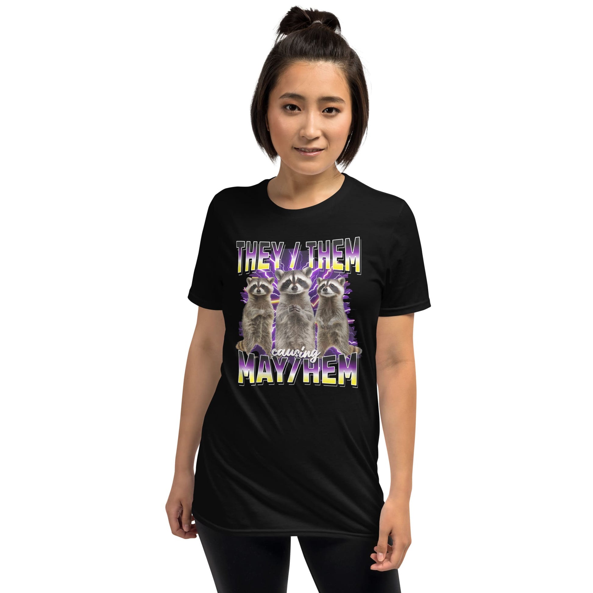 Person wearing a y2k black bootleg enby pride t-shirt with they them pronouns