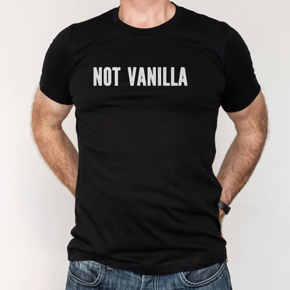 Black t-shirt with 'NOT VANILLA' text worn by a person on a white background