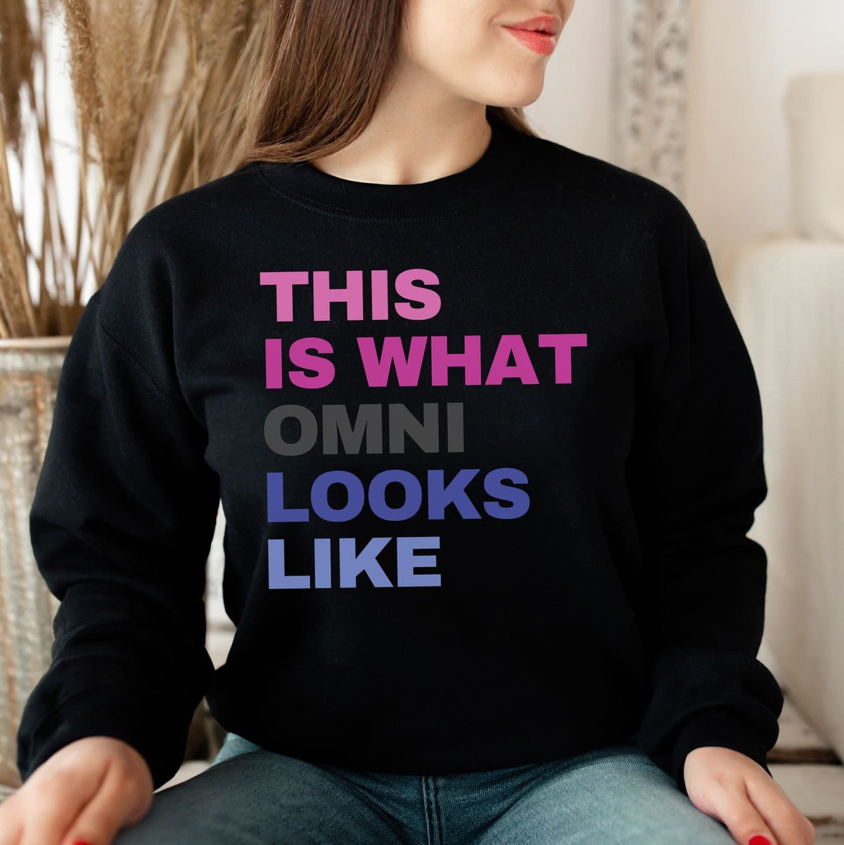 woman wearing omnisexual sweatshirt in black