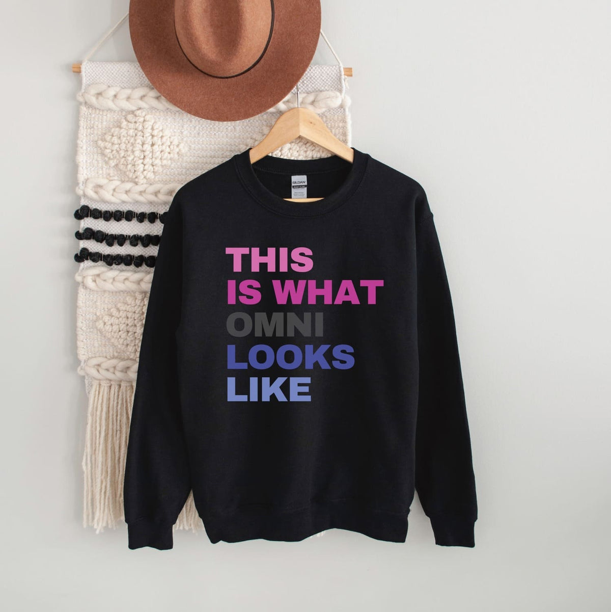 omnisexual sweatshirt in black hanging