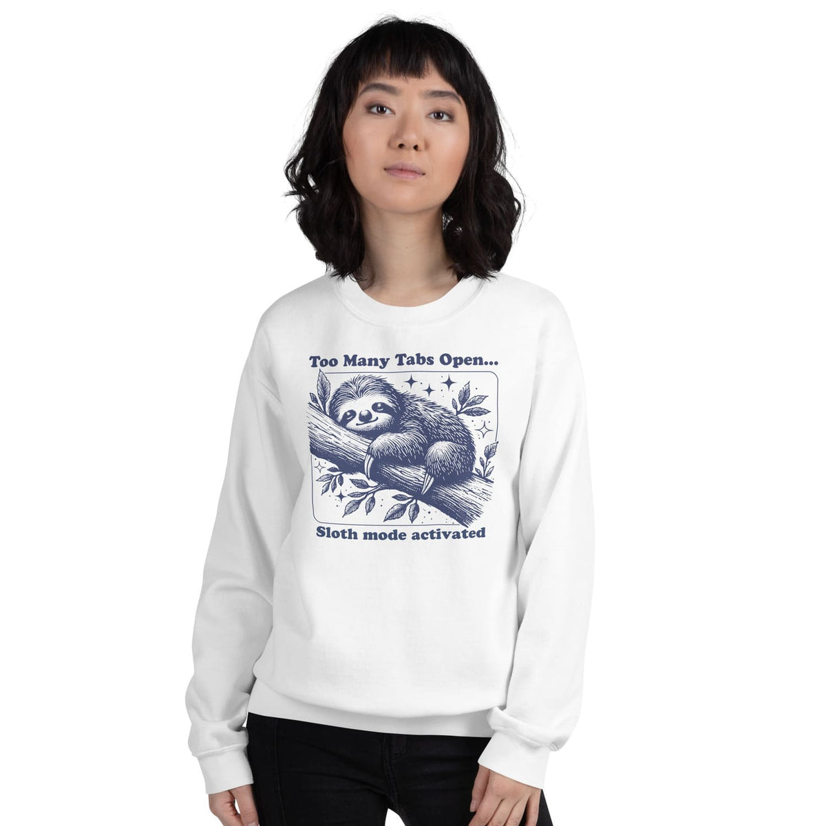 Person wearing a white sweatshirt with an overstimulated sloth graphic and text on a white background