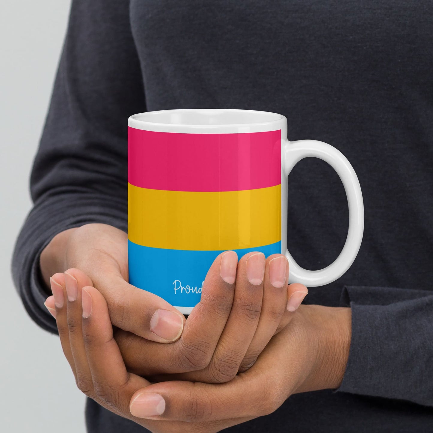 pansexual coffee mug on hands