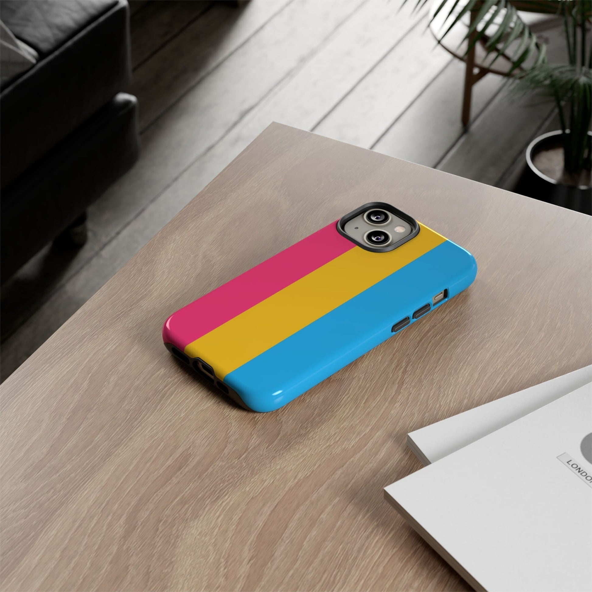 pansexual flag phone case, on table