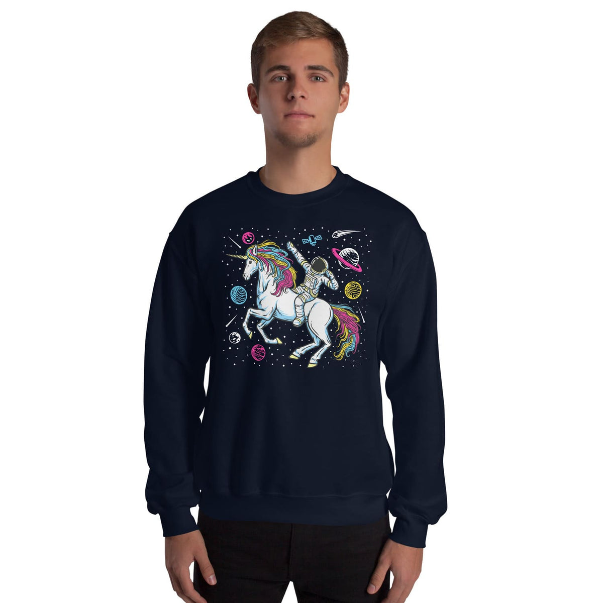 Person wearing a navy blue sweatshirt with a pansexual unicorn design on a white background