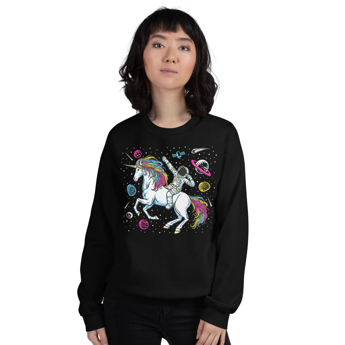 Person wearing a black sweatshirt with a pansexual unicorn and astronaut design on a white background