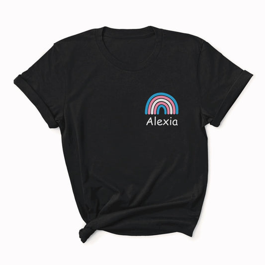 Black t-shirt with a colorful rainbow design and 'Alexia' text on a white background: Personalized Name Transgender Shirt, Chosen Name Trans Pride Tee, Cute Rainbow Pocket Design T-Shirt, Custom MTF Or FTM Coming Out Gift