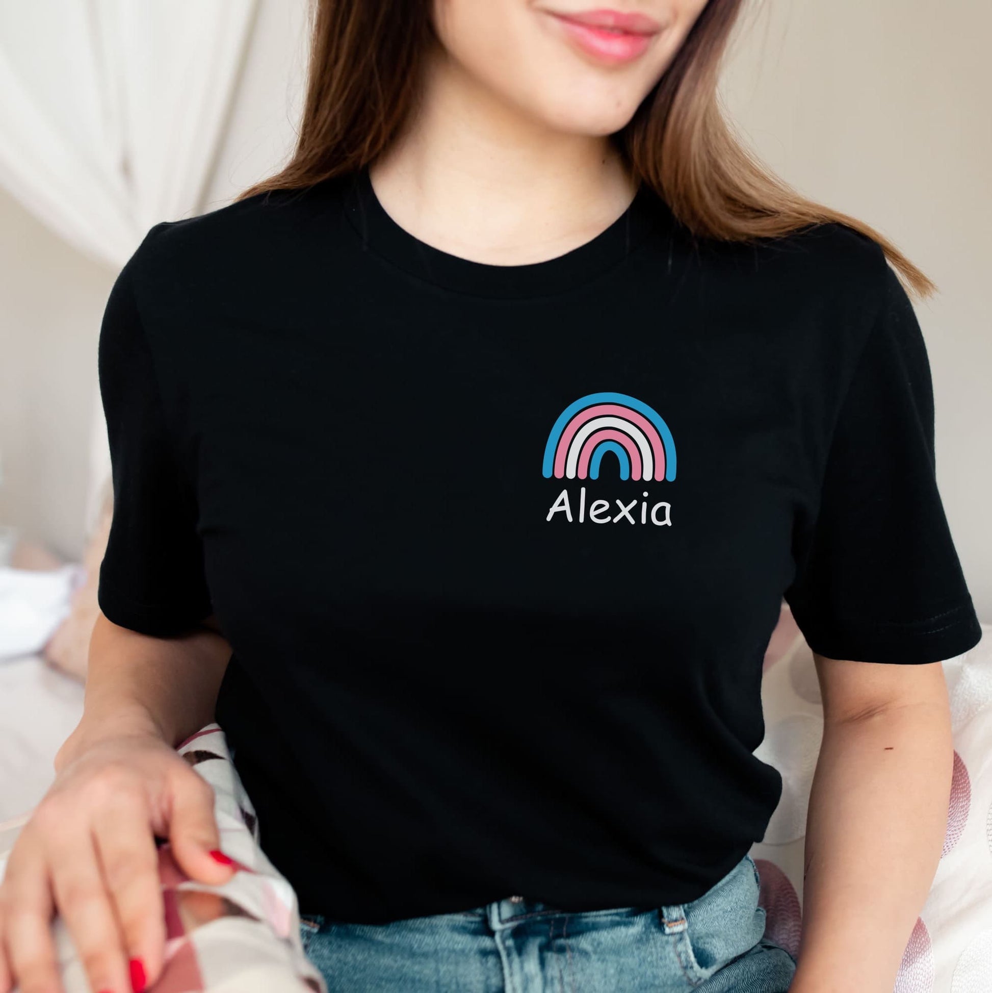 Person wearing a black t-shirt with a rainbow and 'Alexia' design: Personalized Name Transgender Shirt, Chosen Name Trans Pride Tee, Cute Rainbow Pocket Design T-Shirt, Custom MTF Or FTM Coming Out Gift