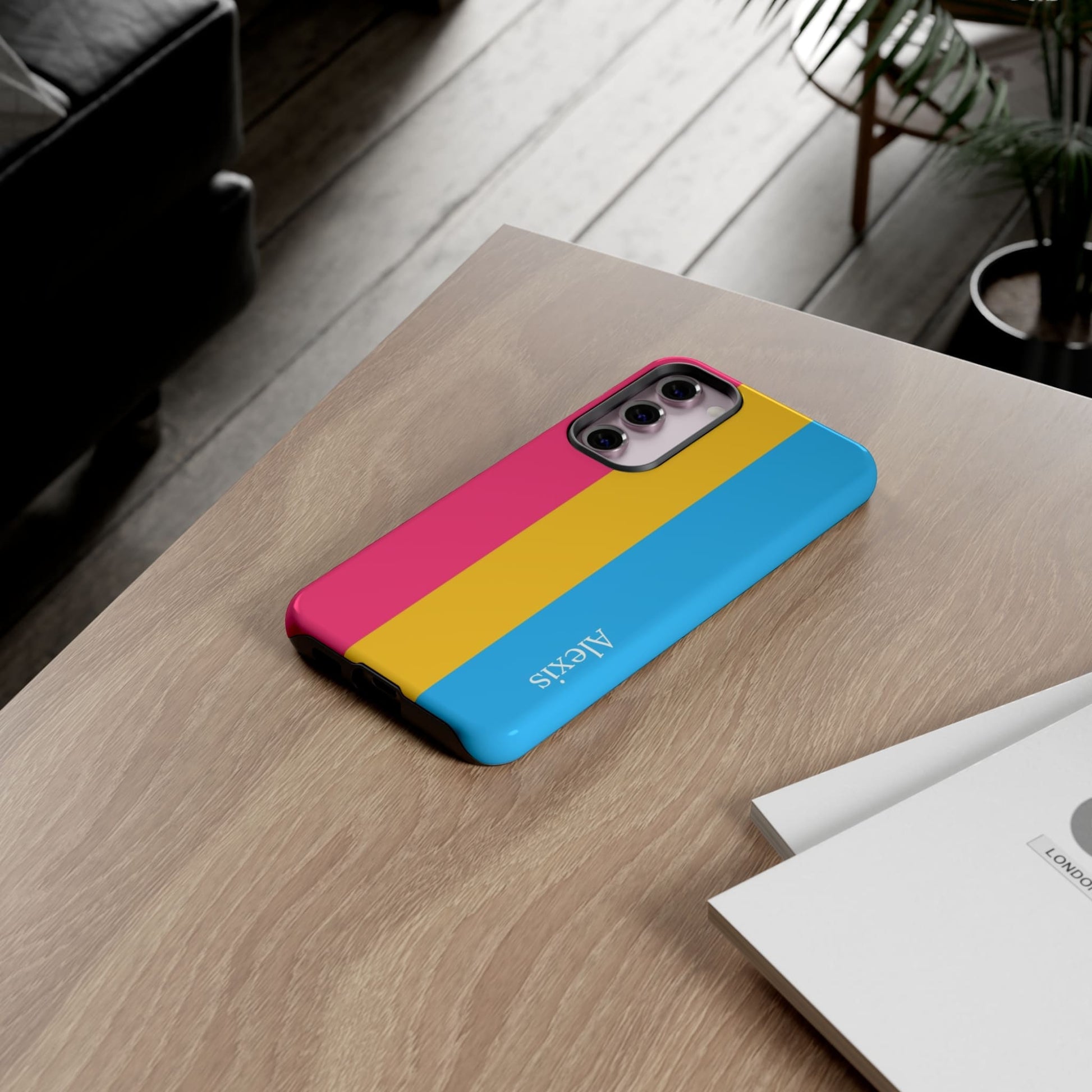 personalised pansexual flag phone case, on table