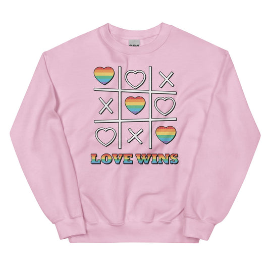Pink LGBTQ pride sweatshirt with rainbow hearts and 'LOVE WINS' text on a white background