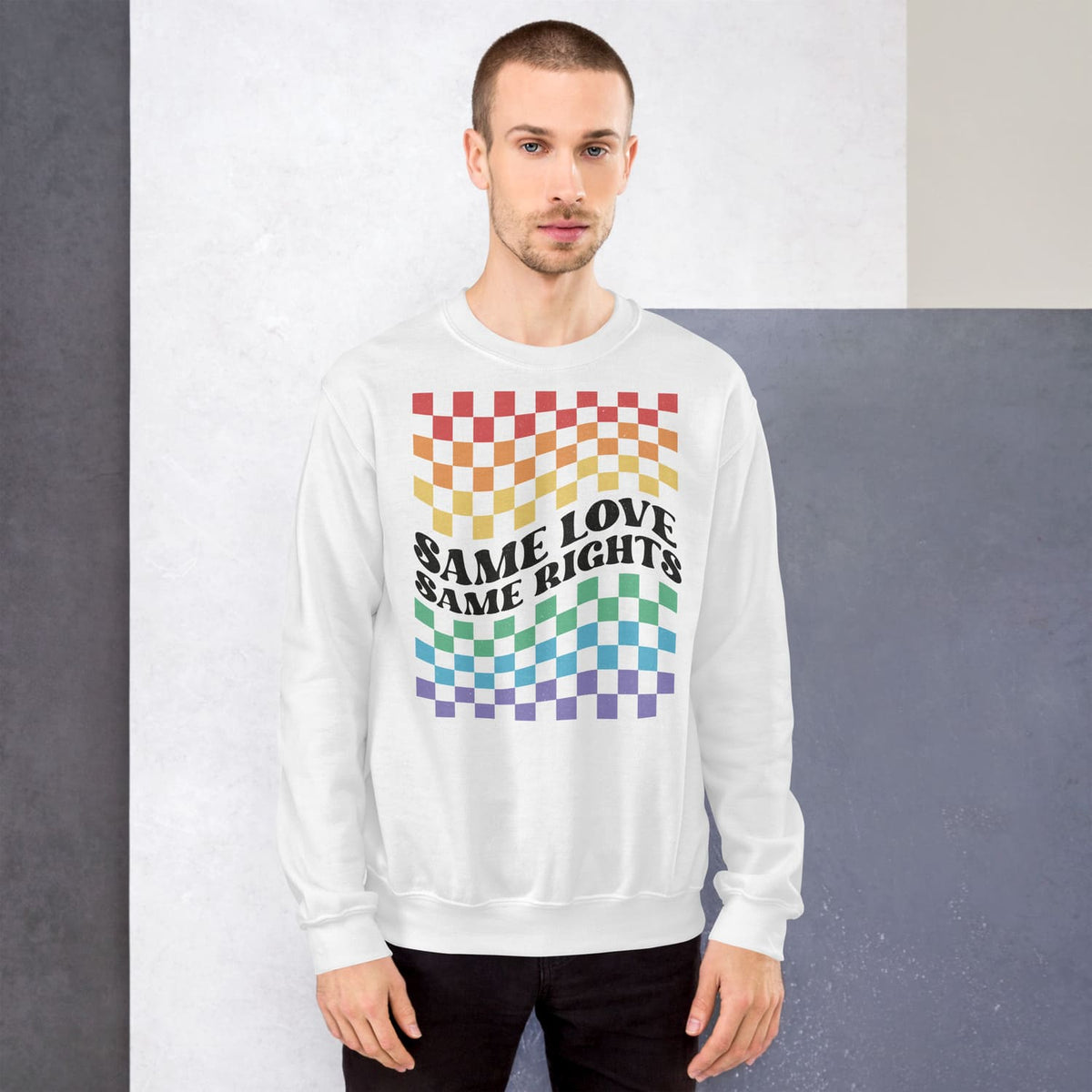 Person wearing a white pride sweatshirt with rainbow checkered pattern and 'Same Love Same Rights' text.