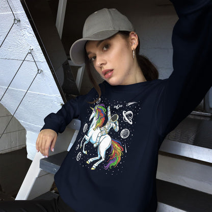 Person wearing a navy sweatshirt with a rainbow lgbtq unicorn design, sitting on stairs. 