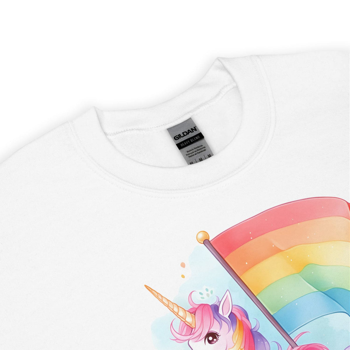 detail of pride sweatshirt  with a colorful unicorn and rainbow design on a white background