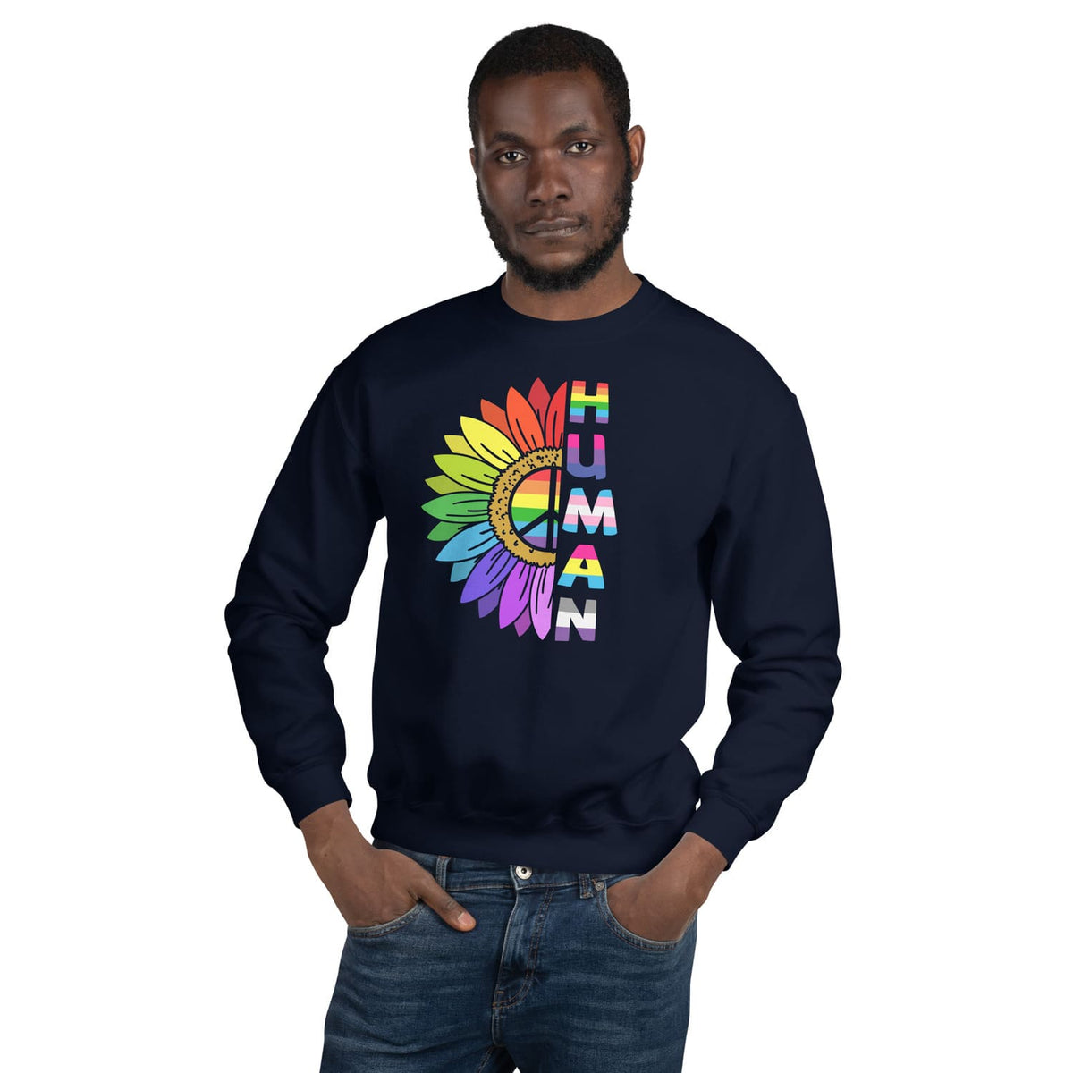 Person wearing a navy LGBT pride sweatshirt with a colorful 'HUMAN' design on a white background