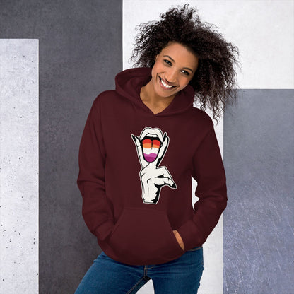 Person wearing a maroon hoodie with a suggestive lesbian design on a gray and white background