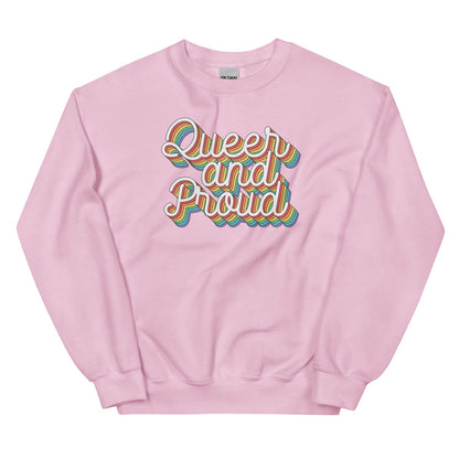 Pink LGBTQ pride sweatshirt with 'Queer and Proud' text in rainbow colors on a white background