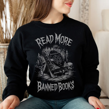 Person wearing a black sweatshirt with 'Read More Banned Books' design
