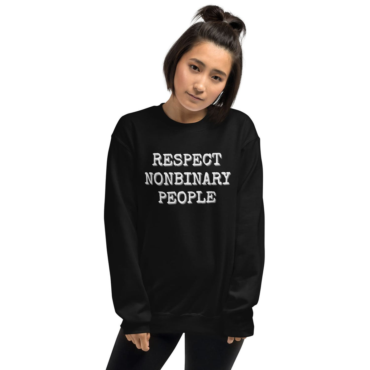 Person wearing a black sweatshirt with 'RESPECT NONBINARY PEOPLE' text on a white background
