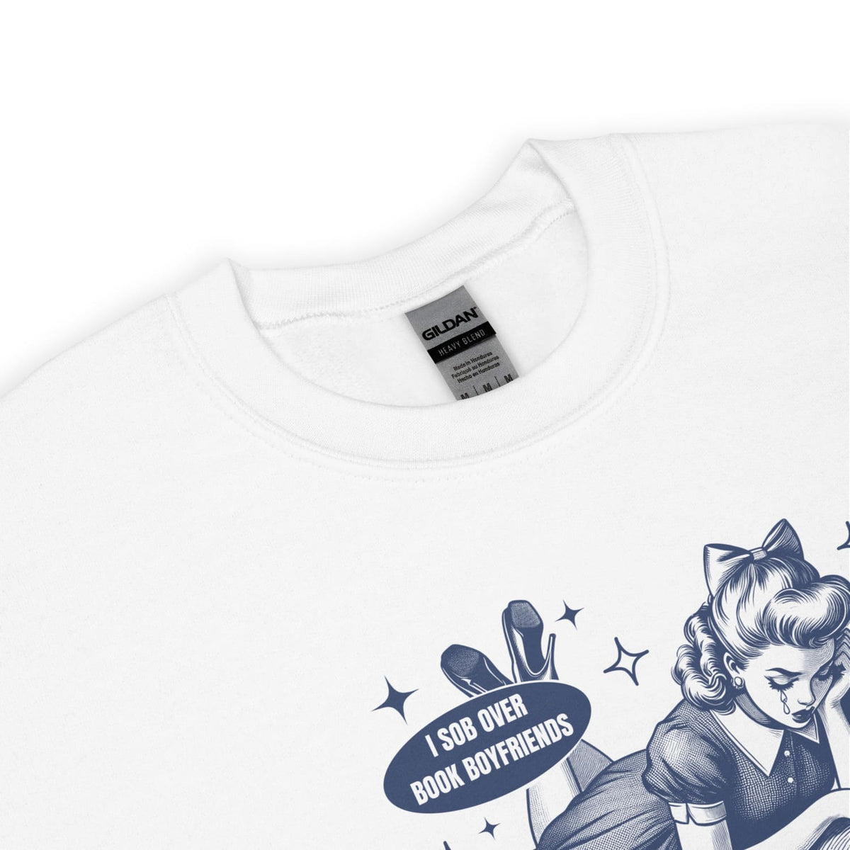 White bookish sweatshirt with graphic design and text on a white background