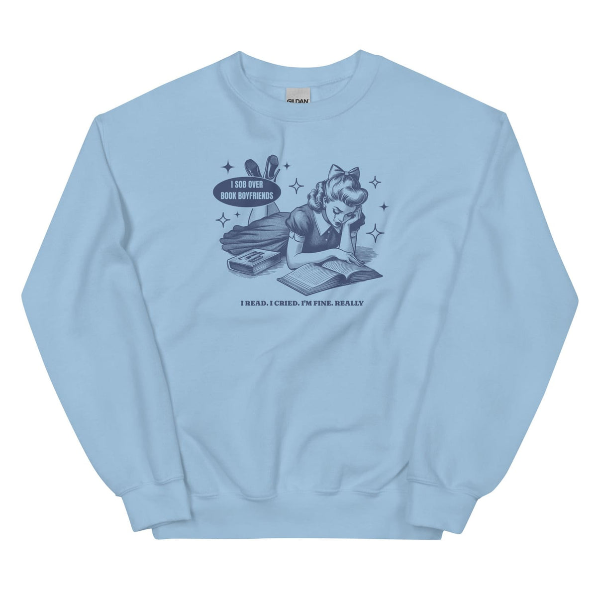 Light blue sweatshirt with graphic design of a girl reading a book and text on a white background