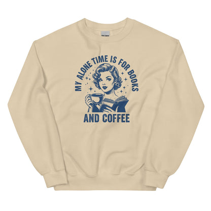 Beige sweatshirt with graphic design of a woman reading a book and holding a coffee cup, with text 'My alone time is for books and coffee'.