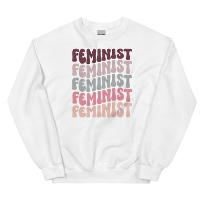 White sweatshirt with 'Feminist' text in various colors on a white background