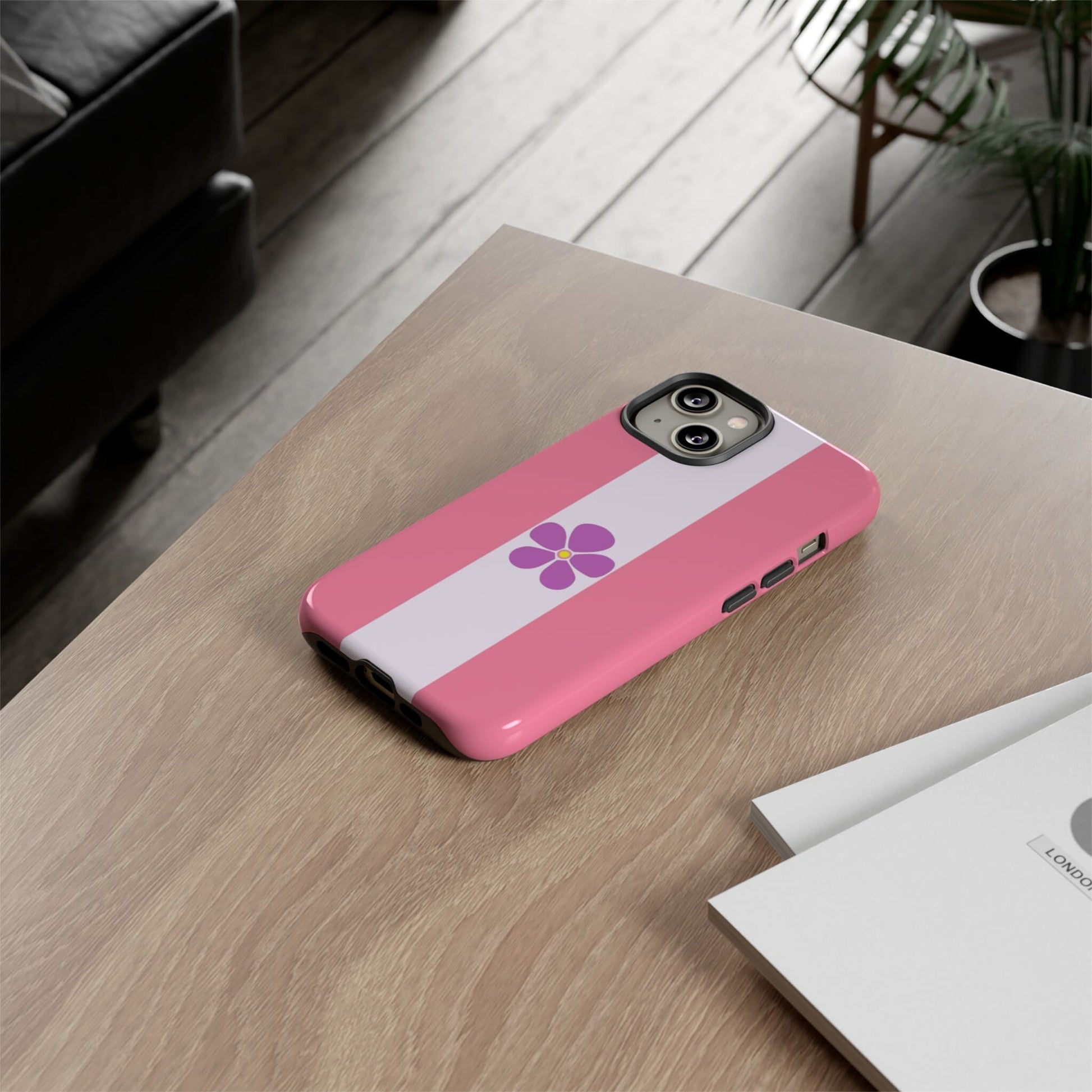 sapphic flag phone case, on table