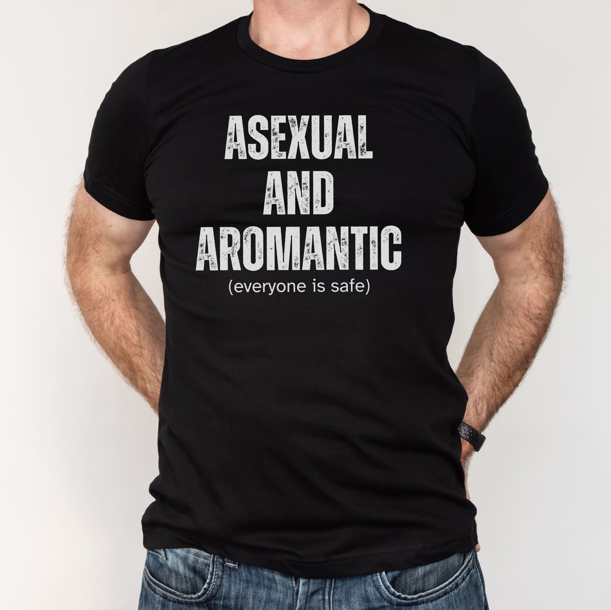 Black t-shirt with 'Asexual and Aromantic (everyone is safe)' text worn by a person on a white background