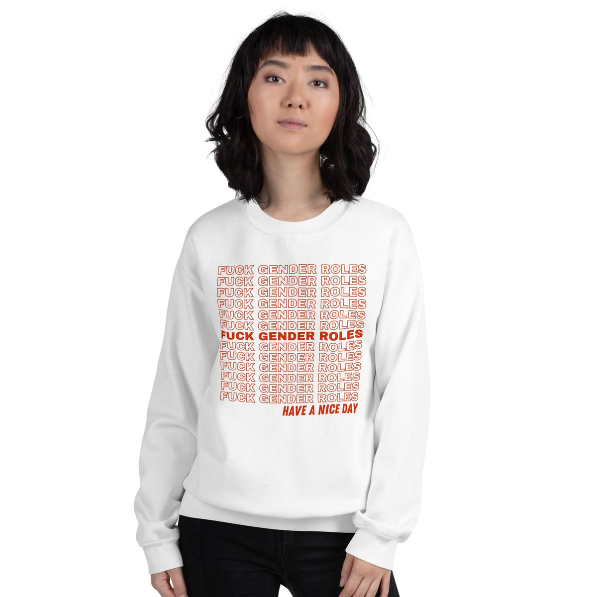 Person wearing a white non binary sweatshirt with red text on a white background