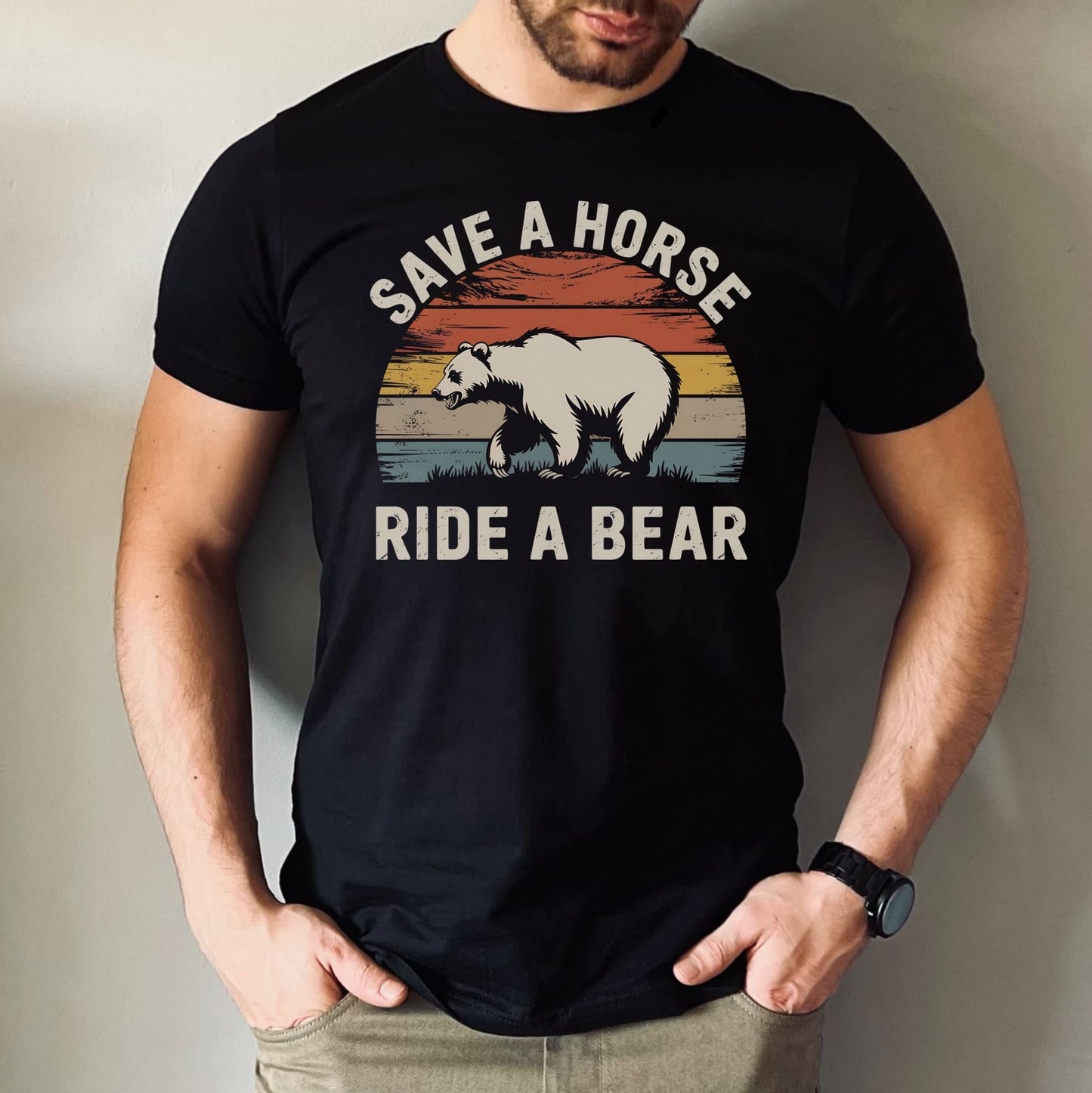 Person wearing a black t-shirt with a graphic of a bear and text 'Save a horse, ride a bear' on a plain background: Funny Gay Bear Shirt, Save A Horse Ride A Bear Tee, MLM Rodeo Cowboy Tshirt, Gay Male Homosexual Apparel, Country Pride Gift For Boyfriend
