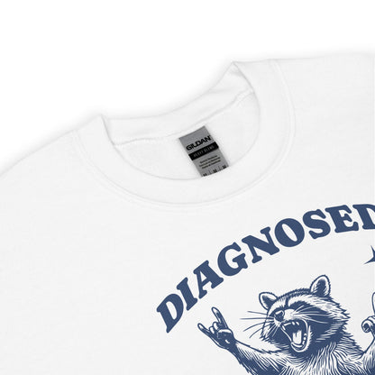 White sweatshirt with ' DIAGNOSED with adhd' text and raccoon graphic on a white background