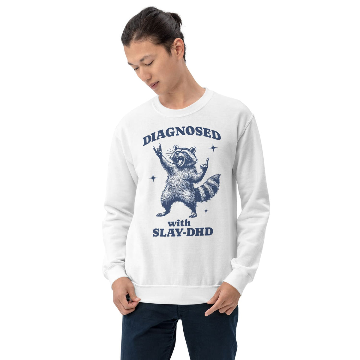 Person wearing a white adhd sweatshirt with a raccoon graphic and text on a white background