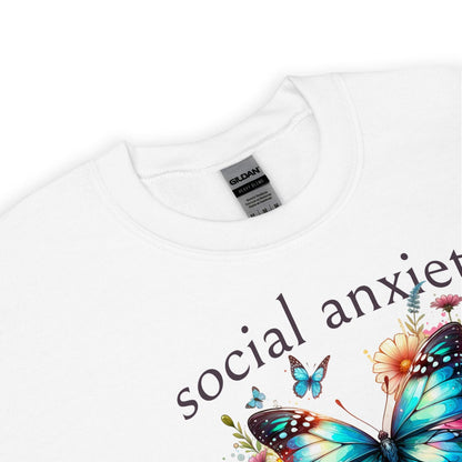 White sweatshirt with 'social anxiety' text and butterfly design on a white background