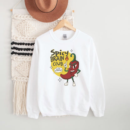 White neurodivergent sweatshirt with 'Spicy Brain Club' graphic on a hanger against a white background
