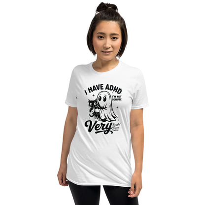 Person wearing a white t-shirt with a graphic design and text on a white background: Spooky ADHD Shirt, Funny Neurodiversity Halloween Tee, Neurospicy Gift For AuDHD, Mental Health Awareness Tshirt, Cute Neurodivergent Ghost