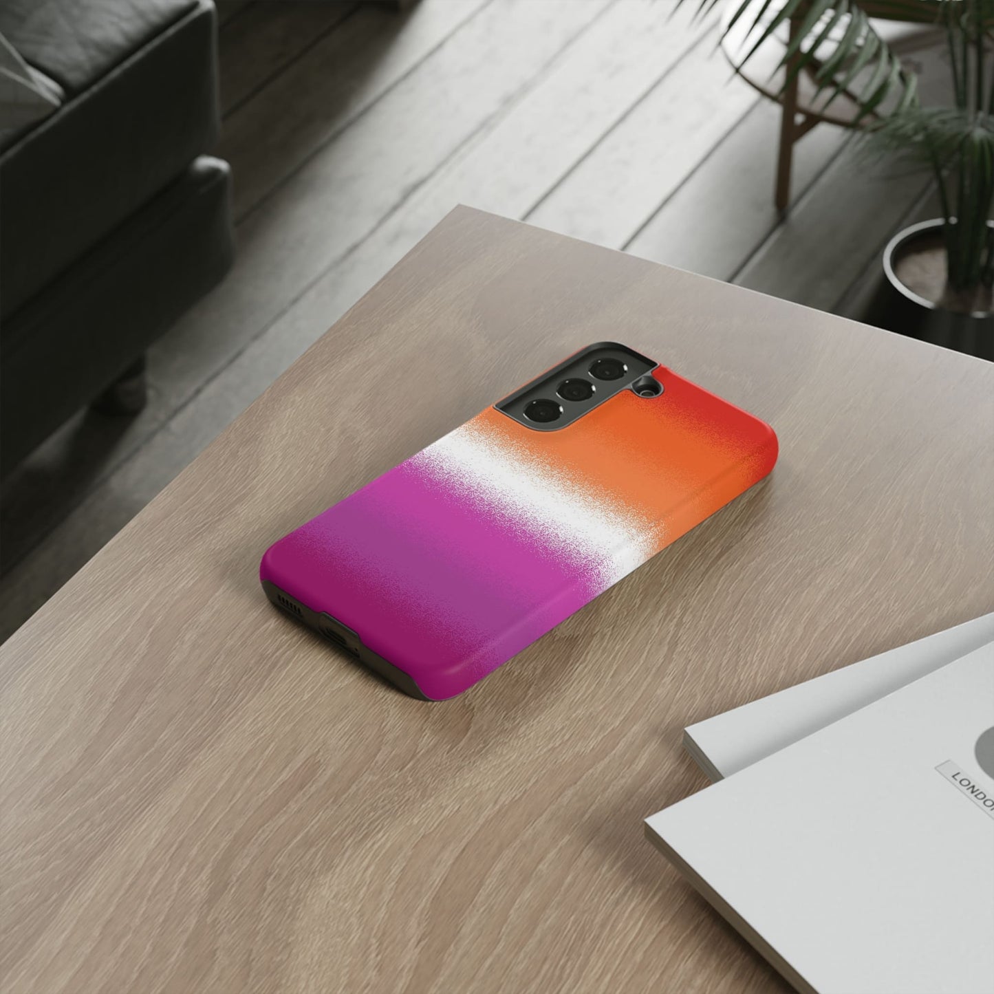 Lesbian phone case sprayed sunset flag, on table